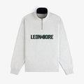 Light gray Aimé Souvenir Quarter Zip with LEON DORE NYC in green and navy text on the front.