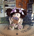 Bambola in Stoffa, bambola di pezza,  Bambola in tessuto con codine. Bambola fatta a mano, bambola bomboniera. Bambola da regalare. Bambola profuma ambiente,  piena di fiori di lavanda. Idee regalo Natale bambola fatta a mano.  Bambolina con lavanda realizzata con stoffa color naturale, decorata con rose. La bambolina fatta a mano ha delle codine more e tiene in mano un piccolo cestino di fiori. Idea regalo Natale, idea regalo compleanno. Idea bomboniera.