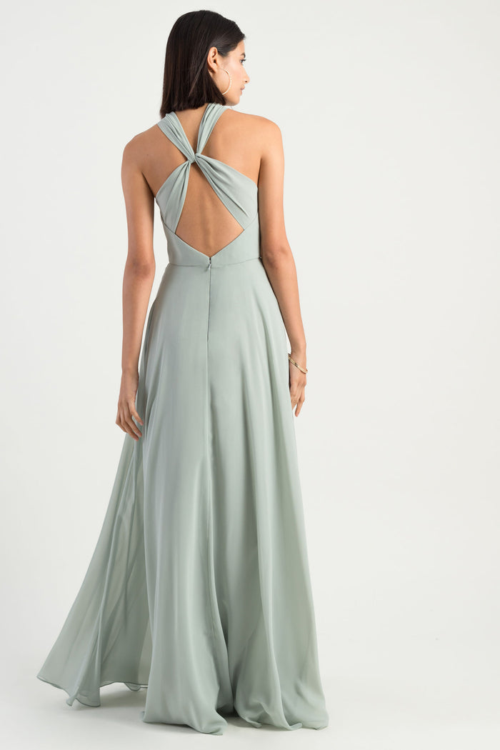 high halter neckline with a unique twist back detail in flowy luxe chiffon