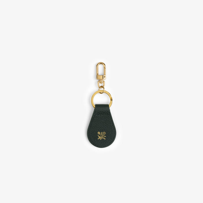 Dark green Leather Key Fob with gold clasp and small gold floral design, shown on a white background.