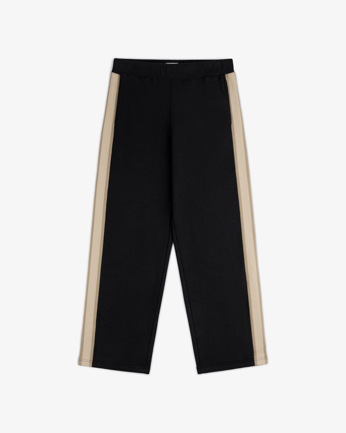 Saint George Track Pant: black with beige side stripes, elastic waist, straight leg, shown flat on white background.