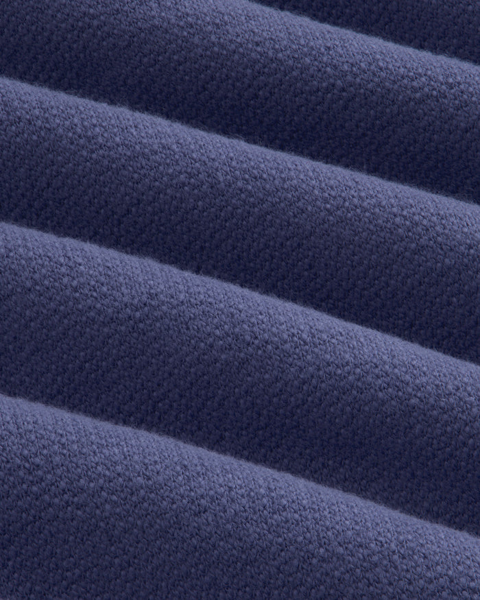 Close-up of Stone Washed Marina Sweatpants showing textured dark blue fabric with visible knit and soft ridges.