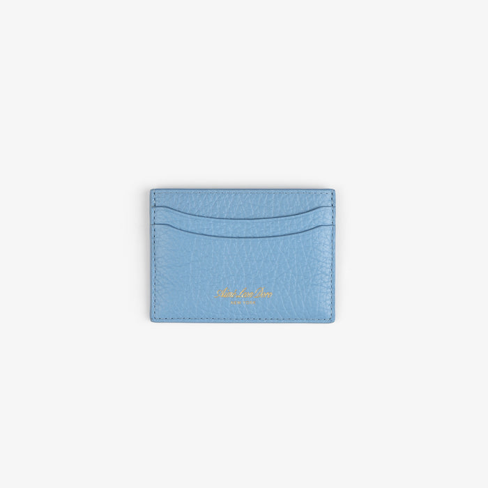 Tumbled Leather Card Holder in light blue with two slots and gold embossed text, shown on a white background.
