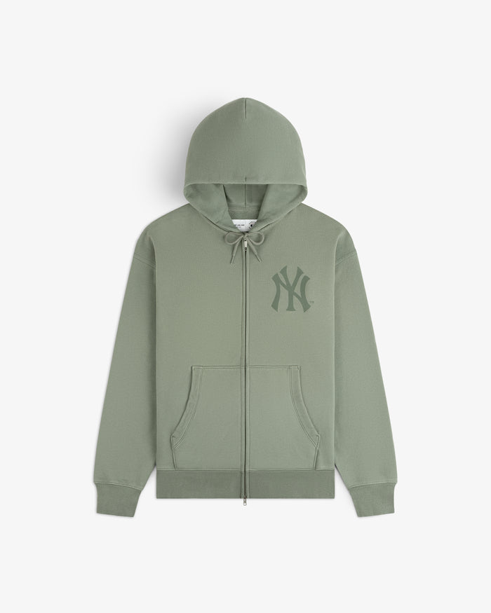 Yankees Washed Full-Zip Hoodie in light green with front pockets and logo on chest, shown flat on white background.